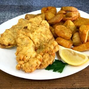 Escalope de ternera a la romana con batatas fritas