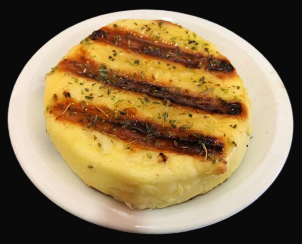 Provoleta con aceite de oliva y orégano