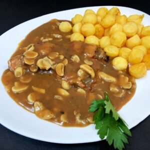 Pollo al champiñón con papas noisette