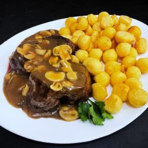 Lomo al champiñón con papas noissette